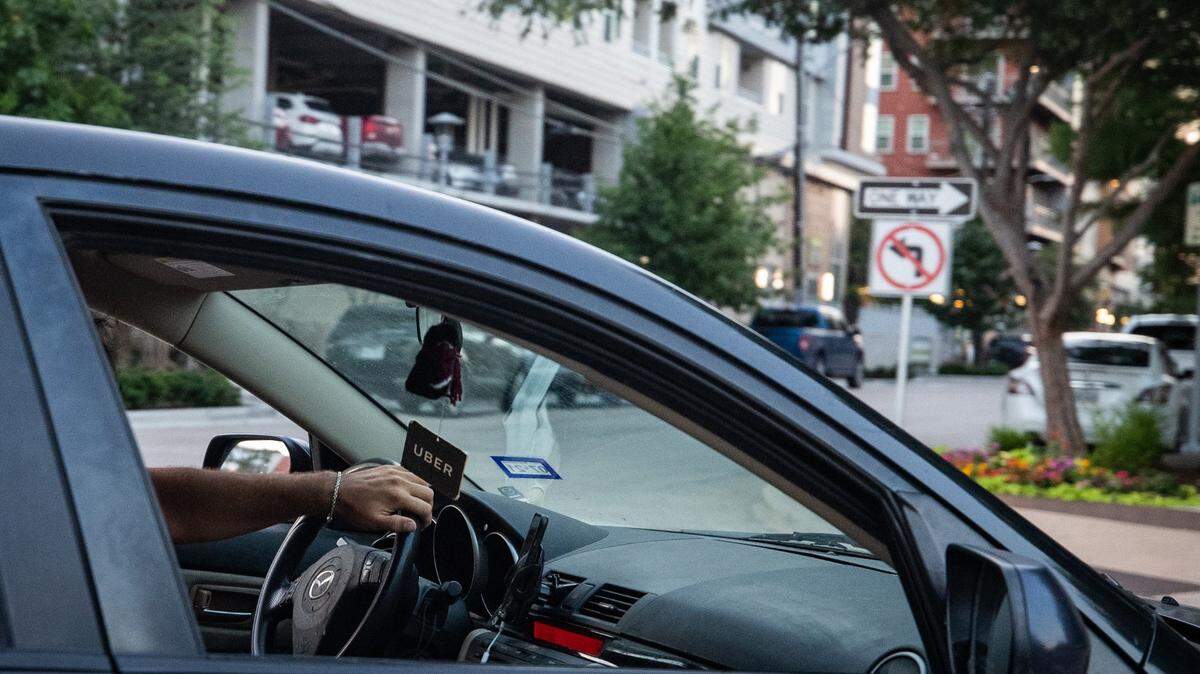 An Uber driver makes their way around West 7th District Friday, June 11, 2021, in Fort Worth.