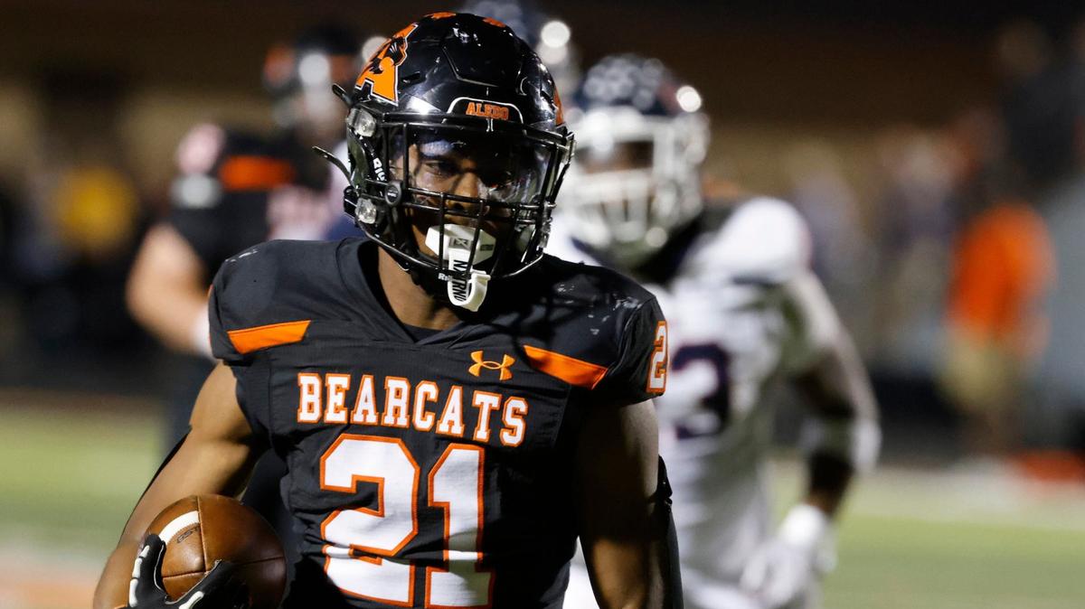 Aledo running back Kaden Winkfield (21) takes the ball to the two yard line late in a UIL football game at Buchanan Stadium in Aledo Texas, Friday, Oct. 04, 2024.
