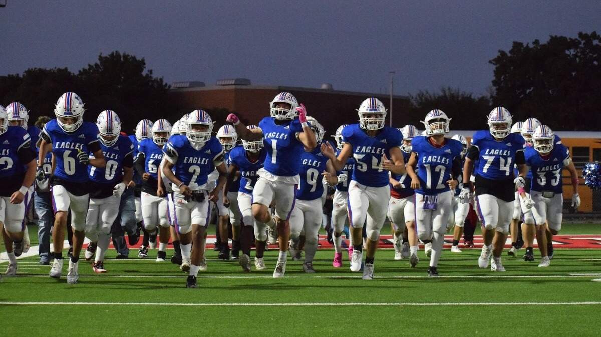 Fort Worth Amon Carter-Riverside runs onto the field during a high school football game against Fort Worth Diamond Hill-Jarvis at Handley Field in Fort Worth, Texas, Friday, October 31, 2025. Carter-Riverside won 49-32.