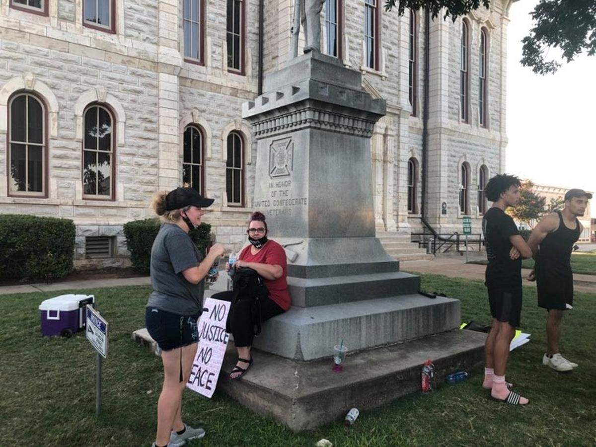 Protesters at the Parker County Courthouse in Weatherford demanded a Confederate statue be removed from the lawn on Monday, Aug. 9.