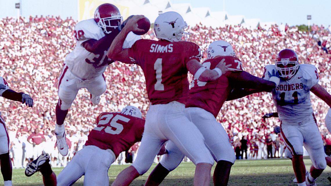 This high-flying hit by Oklahoma safety Roy Williams (38) on Texas quarterback Chris Simms led to a game clinching interception by Teddy Lehman. OU won 14-3 in 2001 at the Cotton Bowl in Dallas. The play is still talked about today.