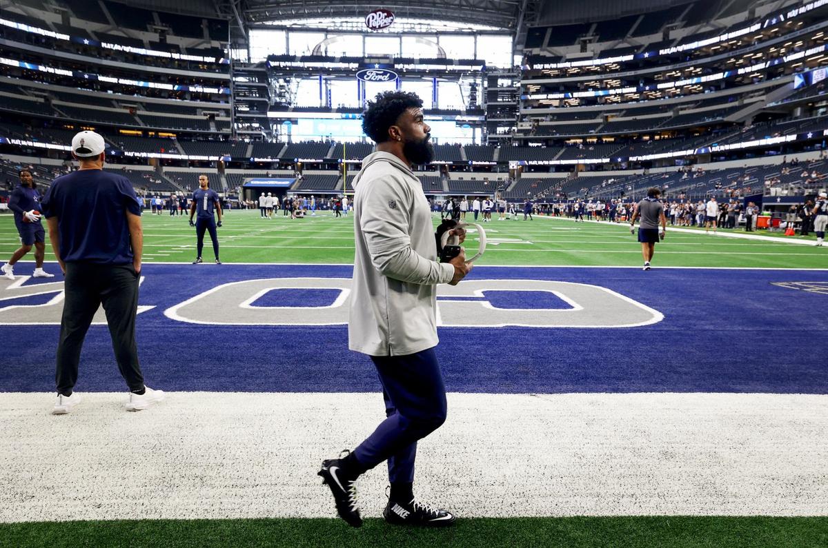 Dallas Cowboys running back Ezekiel Elliott warms up before the start of week three of the NFL preseason matchup against the Los Angeles Chargers on Saturday, Aug. 24, 2024, at AT&T Stadium in Arlington.