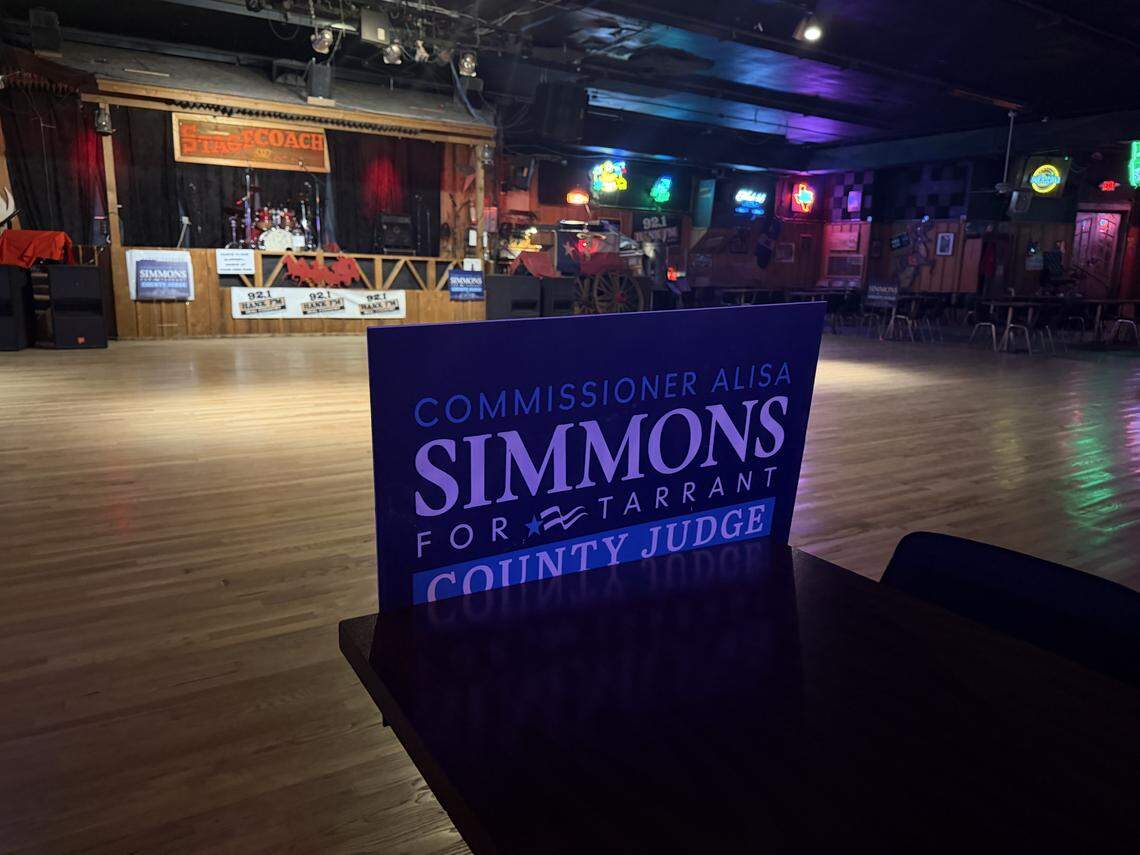 Commissioner and candidate for County Judge Alisa Simmons arrived at the watch party Tuesday night. Her campaign signs were handed out to attendees.