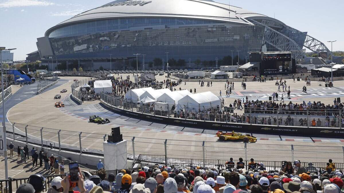 Drivers negotiate the horseshoe on ATT's parking lot at the intersection of Collins St. and Randol Mill Road during the inaugural Java House Grand Prix of Arlington in Arlington, Texas, Sunday, March, 15, 2026.
