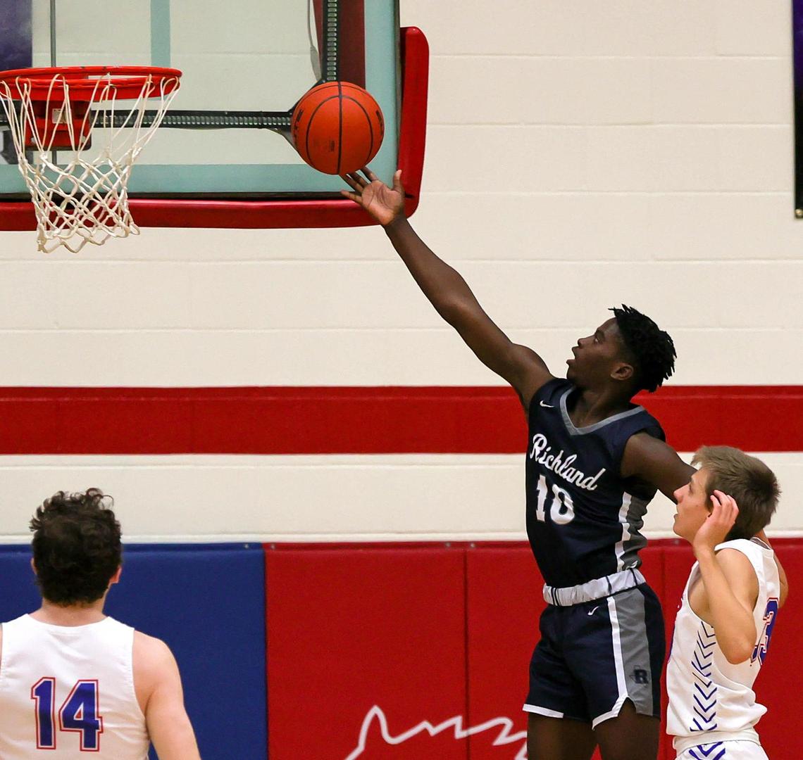Richland guard Jayden Rhinehart (10) drives to the basket for two points against Grapevine during the first half of a High School basketball game, January 25, 2021, played at Grapevine High School in Grapevine, Tx. (Steve Nurenberg Special to the Star-Telegram)
