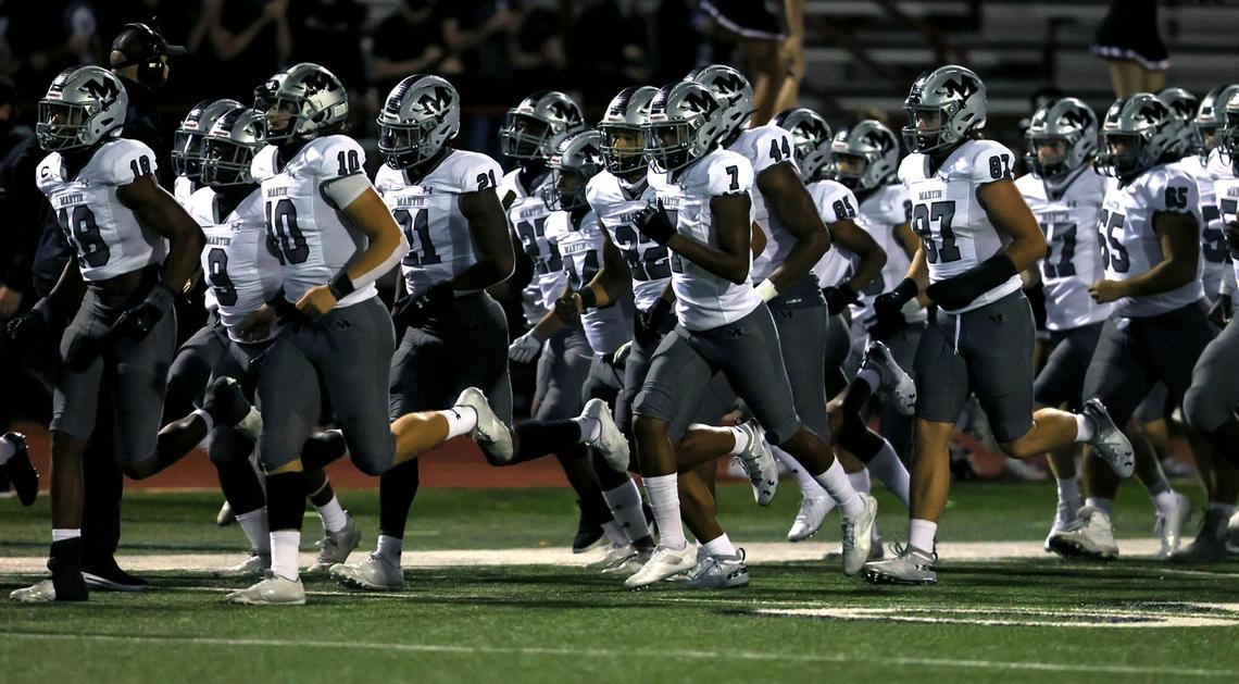 The Arlington Martin Warriors enter the field to face Arlington Bowie in a high school football game, Friday night, November 6, 2020 played at Wilemon Field in Arlington, Tx. (Steve Nurenberg Special to the Star-Telegram)