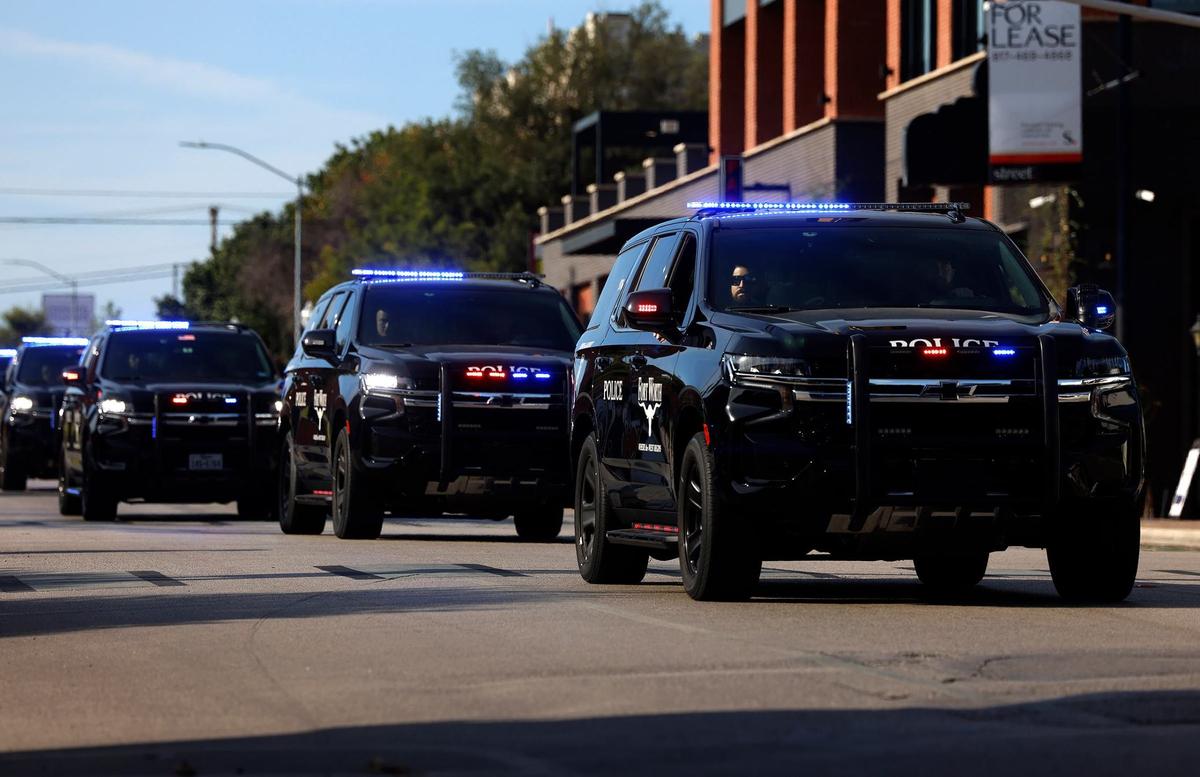 Law enforcement agencies from around North Texas participate in a procession from Bob Bolen Public Safety Complex to Christ Chapel Bible Church for the funeral of fallen Fort Worth police officer Sgt. Billy Randolph on Saturday.