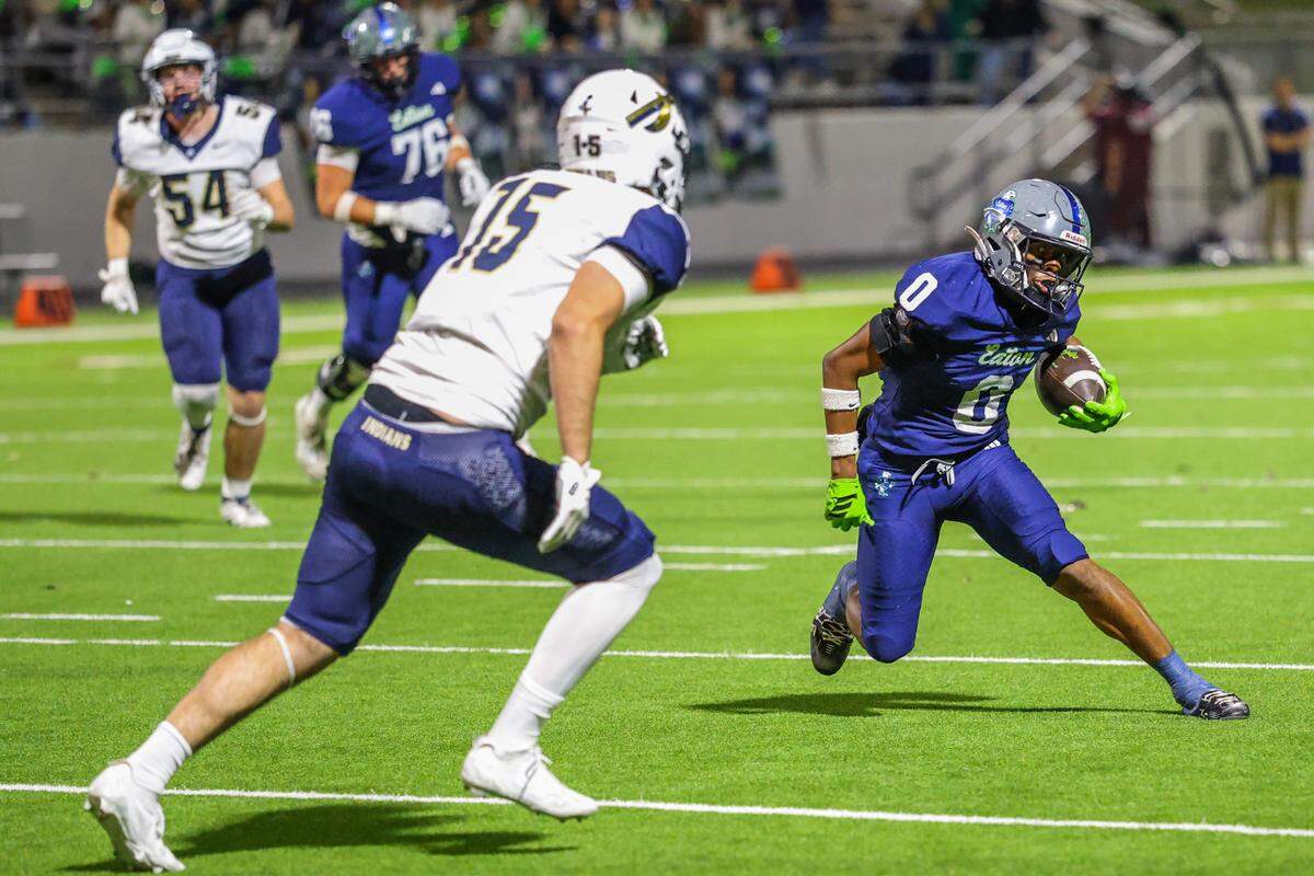 Eaton running back Chris Duharte carries the ball at Northwest ISD Stadium in Justin, Texas, Friday, Nov. 7, 2025.