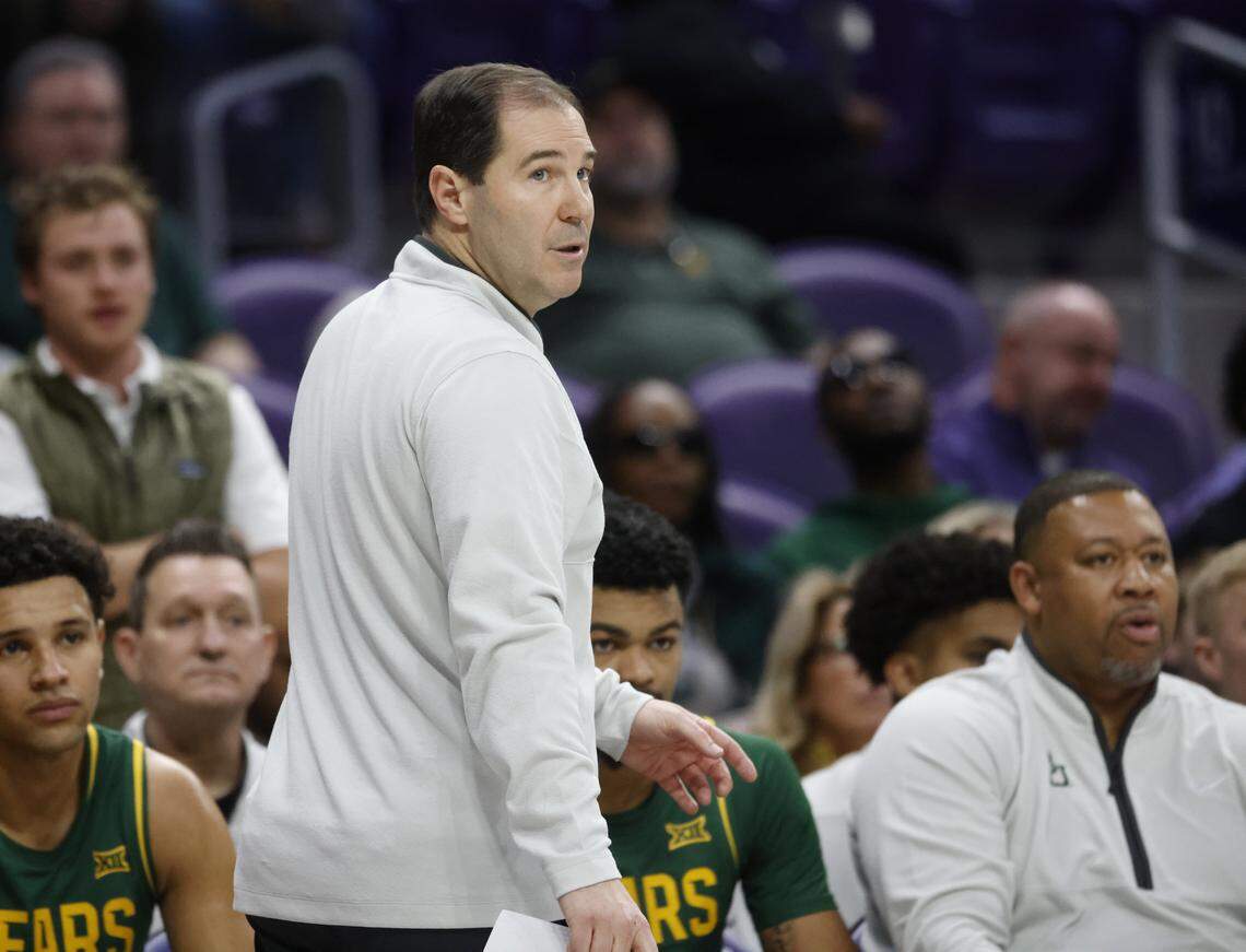 Baylor head coach Scott Drew glances back to the court during the first half of a NCAA basketball game between Baylor University and TCU at Schollmaier Arena in Fort Worth, Texas, Saturday Jan. 03, 2026