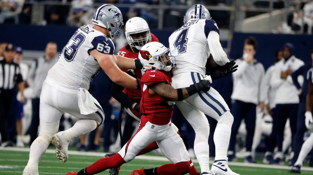 Dallas Cowboys quarterback Dak Prescott (4) and several of his teammates were critical of the officiating after the team’s 25-22 loss to the Arizona Cardinals on Sunday.