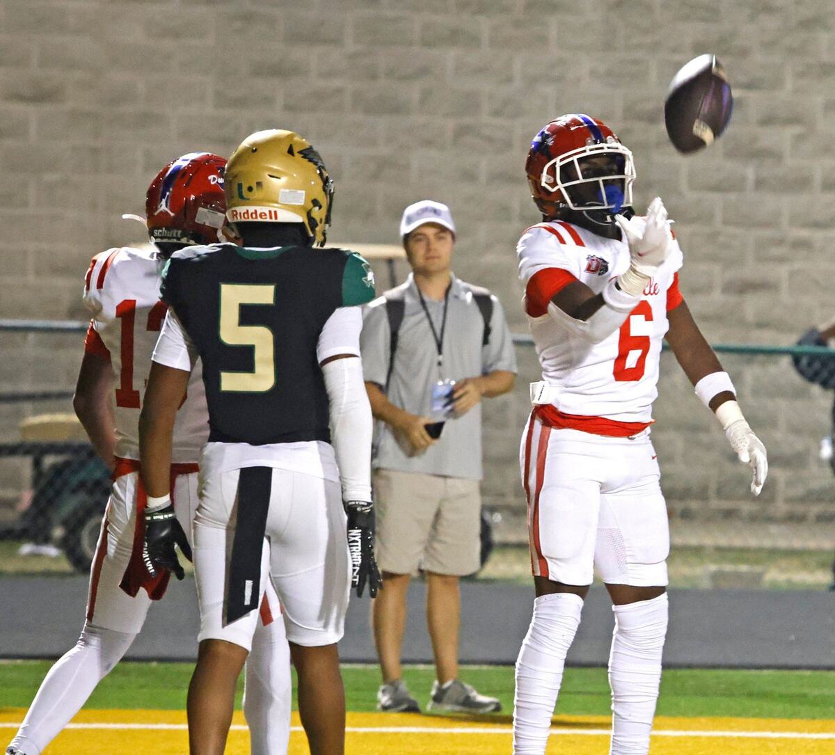 Duncanville wide receiver Trenton Yancey (6) tosses the ball in celebration of this touchdown catch during a District 11 6A football game at Eagle Stadium in DeSoto, Texas, Friday, Oct. 11, 2024.