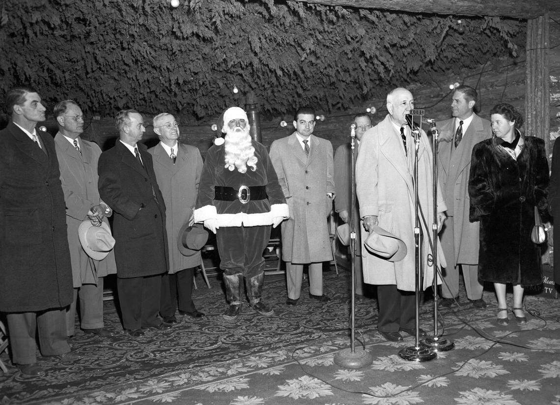 Amon Carter shown speaking at community Christmas Tree.