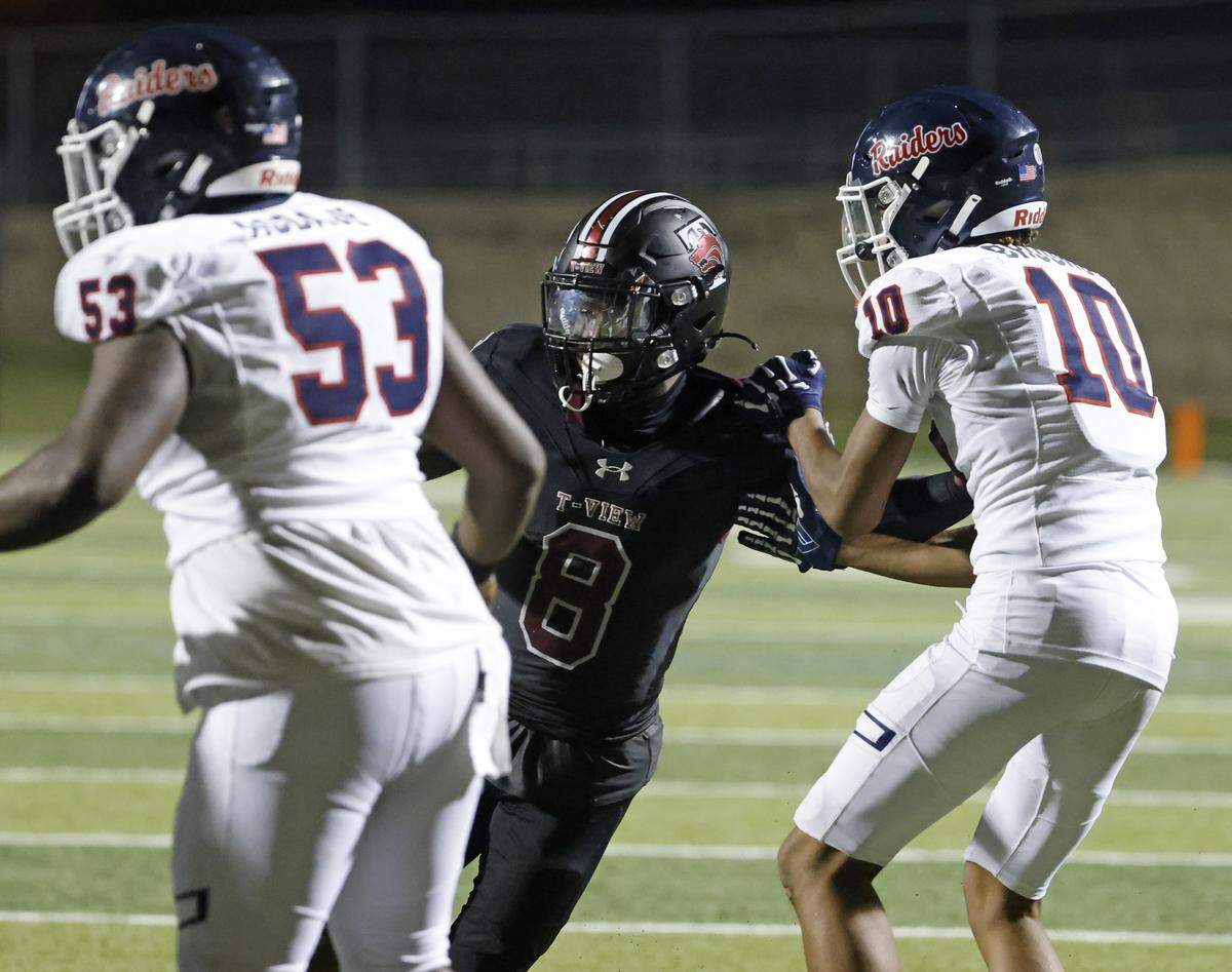 Timberview defensive back Chance Collins (8) works against Ryan wide receiver DeMichael Brooks (10) during the second half of a UIL football game at Vernon Newsom Stadium in Mansfield, Texas, Thursday, Sept. 04, 2025.