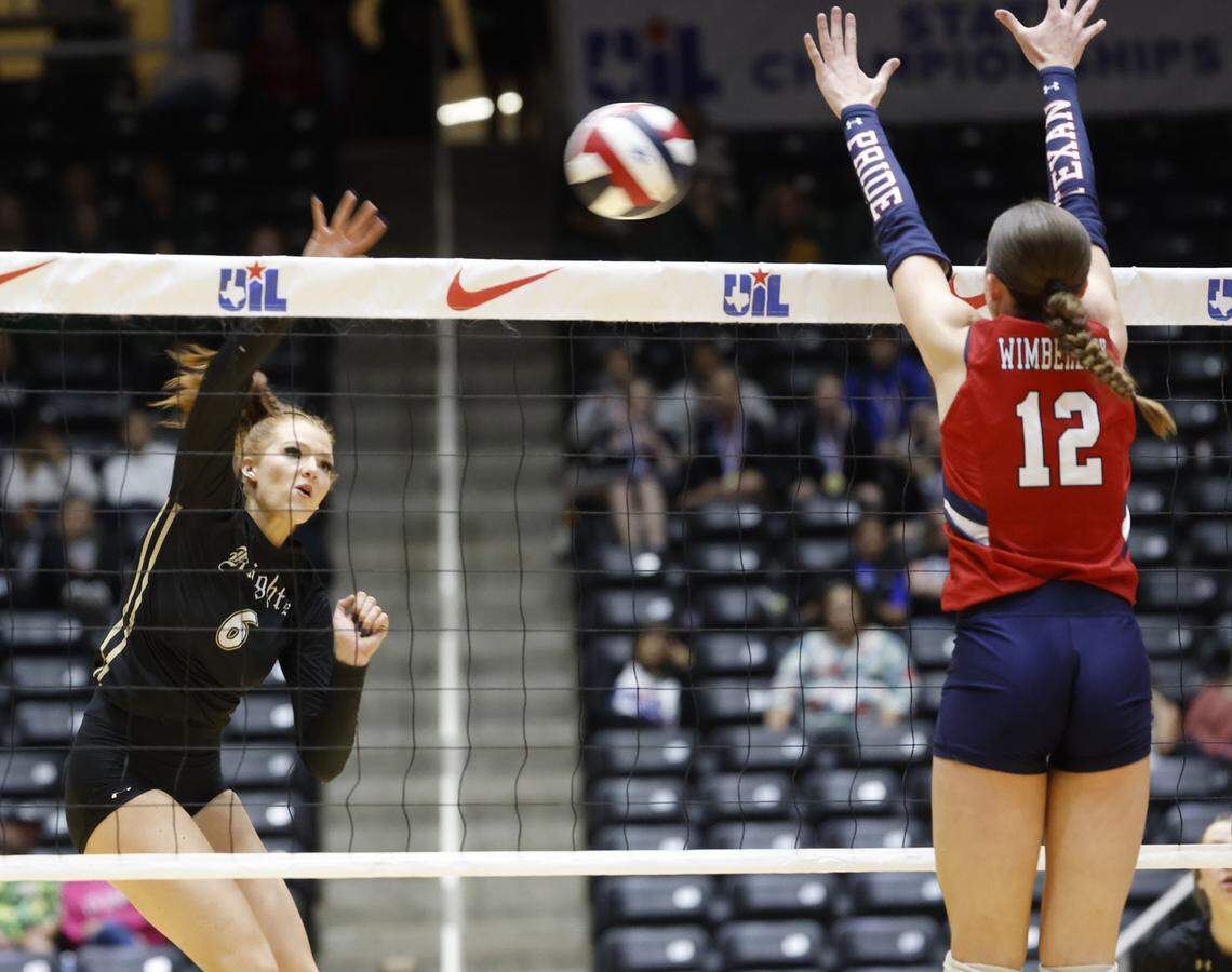 Fort Worth Eagle Mountain outside hitter Brooke Lacewell (6) drives the ball past Wimberley outside hitter Trinity Laney (12) during the second set of the UIL Class 4A Division II state volleyball championship game Friday Nov. 21, 2025 at Curtis Culwell Center in Garland, Texas.