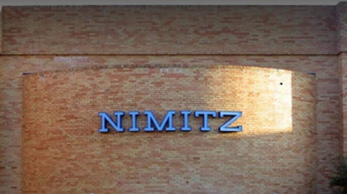 At least one gunshot was fired during a fight in the parking lot of Nimitz High School on Monday afternoon, but no one was injured, according to Irving police.