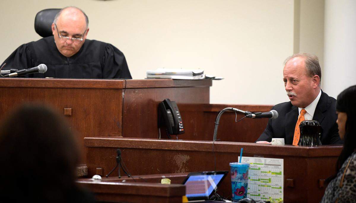 Attorney J. Warren St. John, right, answers questions during a hearing in Ruben Gonzalez's court, State District Court 432 at Tim Curry Justice Center in Fort Worth, Texas, Friday, May 25, 2018.  St. John is the former attorney for Crystal Mason, who was convicted for illegal voting and sentenced to 5 years in prison
