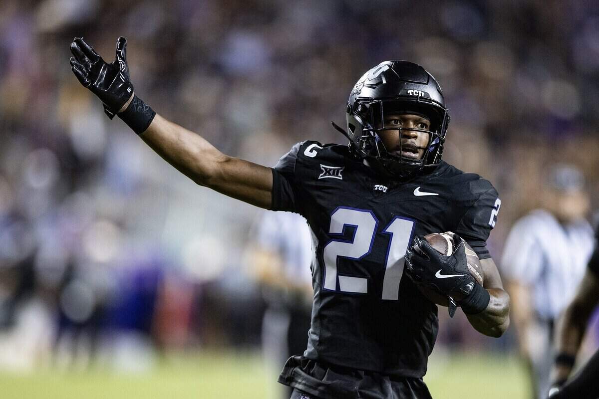 TCU safety Bud Clark (21) celebrates after getting an interception on Colorado quarterback Kaidon Salter (3) in the first half of an NCAA football game between TCU and Colorado at Amon G. Carter Stadium in Fort Worth on Saturday, Oct. 4, 2025.