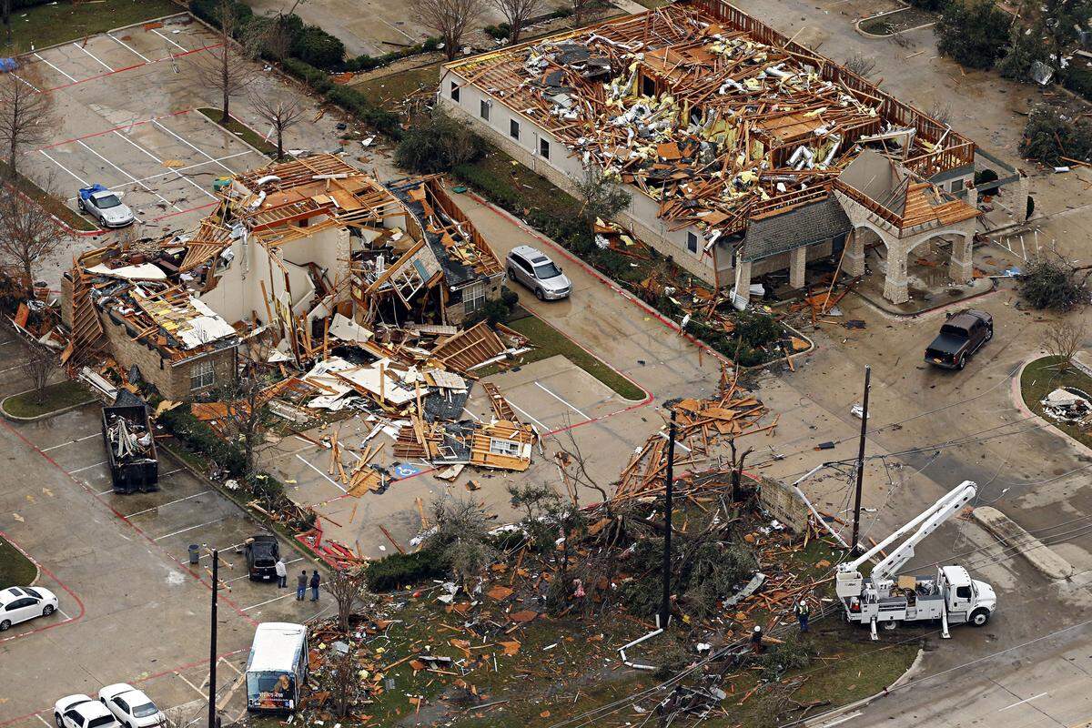 An aerial photograph taken on Monday, Dec. 28, 2015, shows damage to homes in Rowlett, east of Dallas.