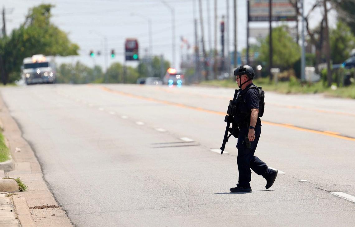 Law enforcement responds to the scene where a Tarrant County sheriff’s deputy was shot three times in Fort Worth on Wednesday, August 7, 2024. The deputy was shot while serving three felony warrants related to the sexual assault of a child, authorities said.