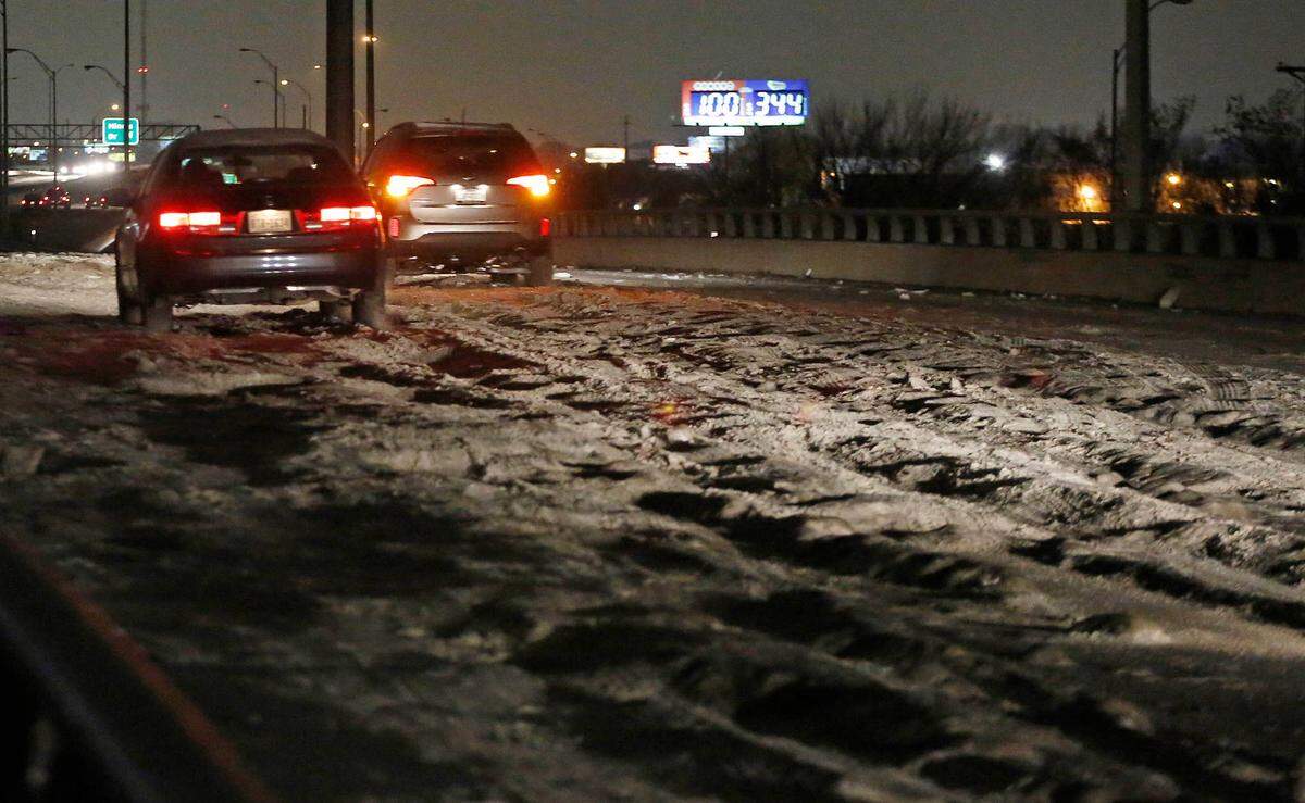 Cobblestone ice on bridges and overpasses makes travel treacherous overnight Saturday as low temperatures continues. TXDOT announced plans to have crews treat the cobblestone ice to make roads safer starting Sunday morning. Seen in Haltom City, TX on December 7, 2013 (Star-Telegram/Ross Hailey)