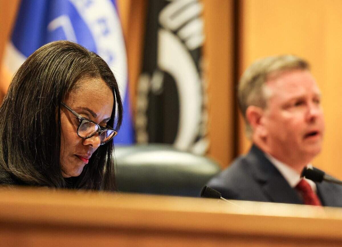 Tarrant County Commissioner Alisa Simmons, an Arlington Democrat, and County Judge Tim O’Hare, a Southlake Republican, listen to public comment during a Commissioners Court meeting May 7, 2024.