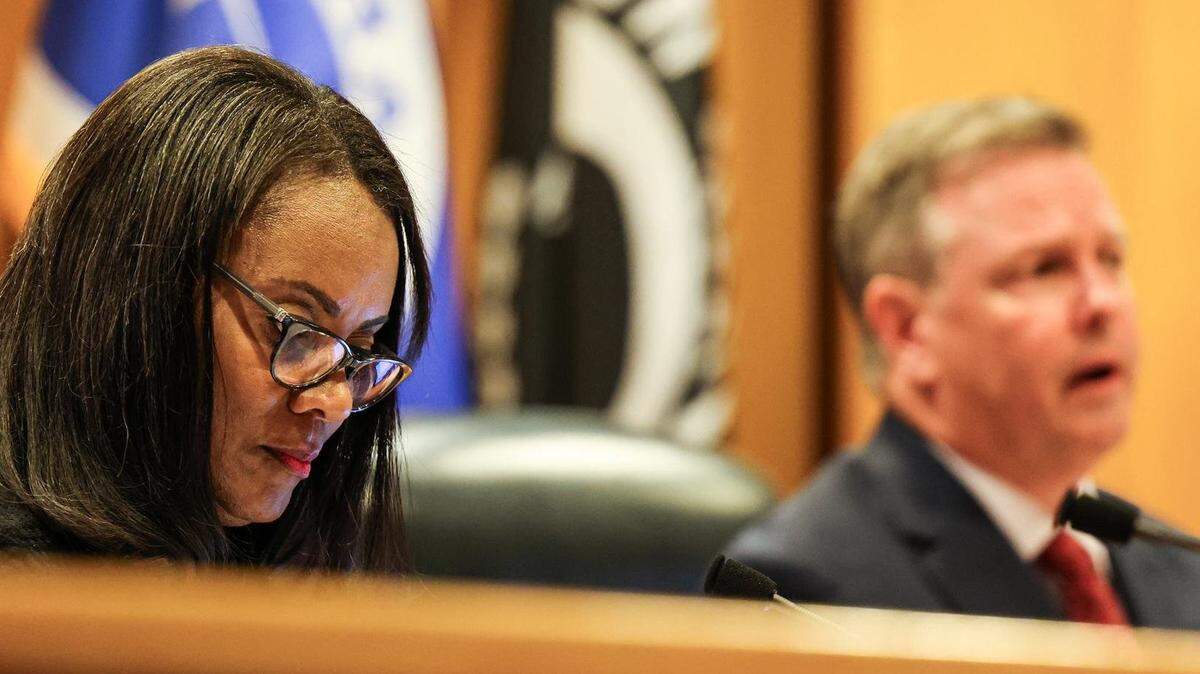 Tarrant County Commissioner Alisa Simmons, an Arlington Democrat, and County Judge Tim O’Hare, a Southlake Republican, listen to public comment during a Commissioners Court meeting May 7, 2024.