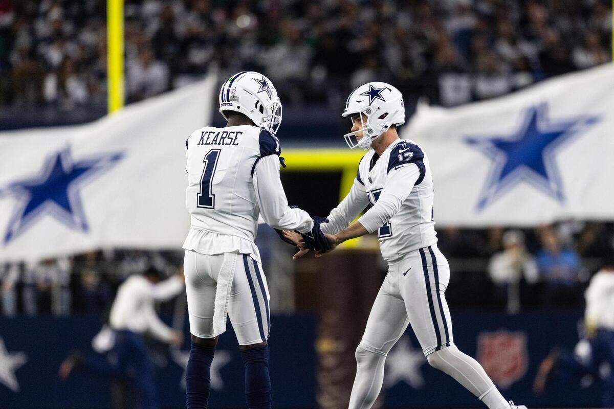 Cowboys safety Jayron Kearse (1) celebrates with kicker Brandon Aubrey (17) after Aubrey made a field goal in the third quarter of an NFL game between the Dallas Cowboys and the Philadelphia Cowboys at AT&T Stadium in Arlington on Thursday, Dec. 10, 2023.