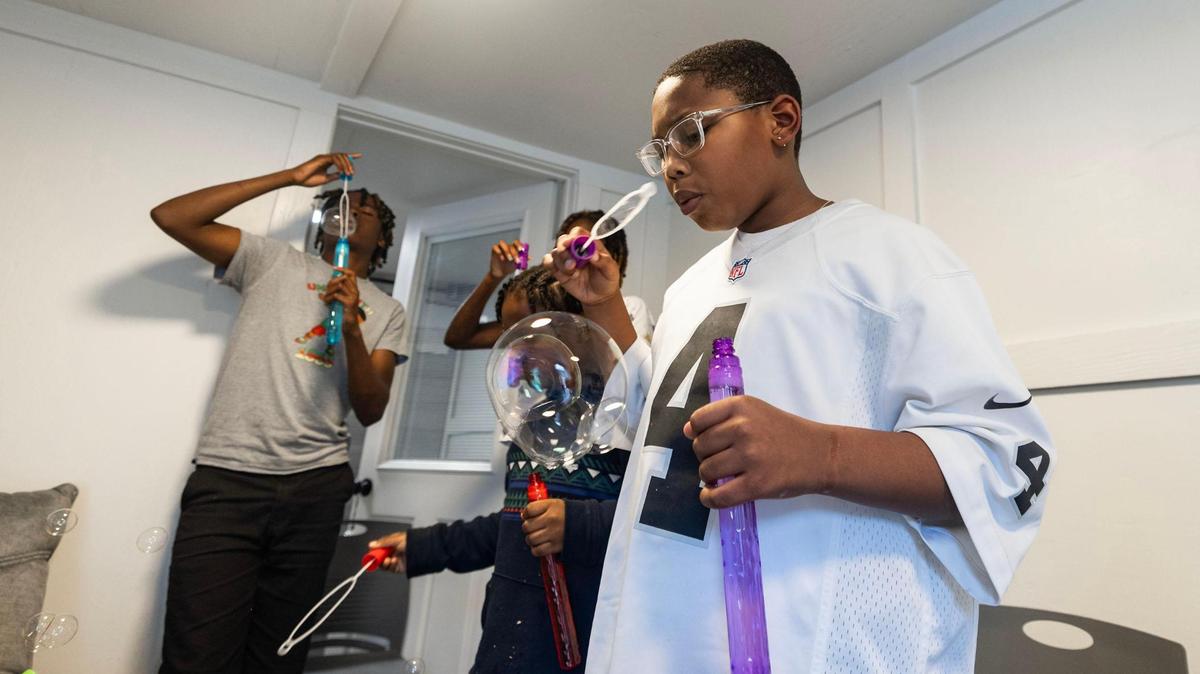 Jayzion Dudley and the other children in the CHAMP program blow bubbles during a group therapy session at Rise Community Center in Fort Worth. CHAMP is a nonprofit organization that provides mental health services for children and families and maternal health services in underserved areas of the city.