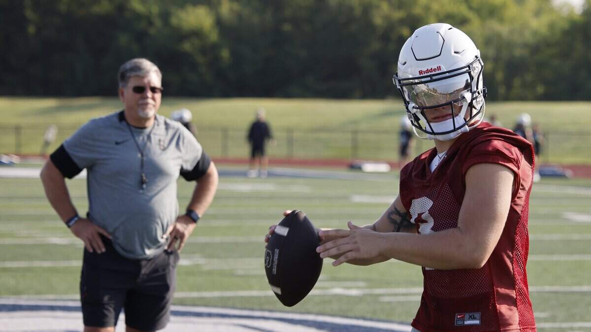Head coach Aaron Beck watches as quarterback Gabe Starling completes a pass during the first practice of 2025 for the All Saints in Fort Worth, Texas, Tuesday August, 05, 2025.


