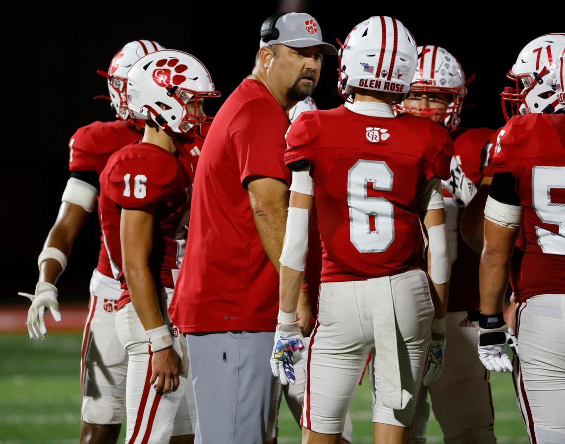Glen Rose head coach Cliff Watkins talks to the team during a time out during a UIL football game at Tiger Stadium in Glen Rose Texas, Friday, Sept. 27, 2024.