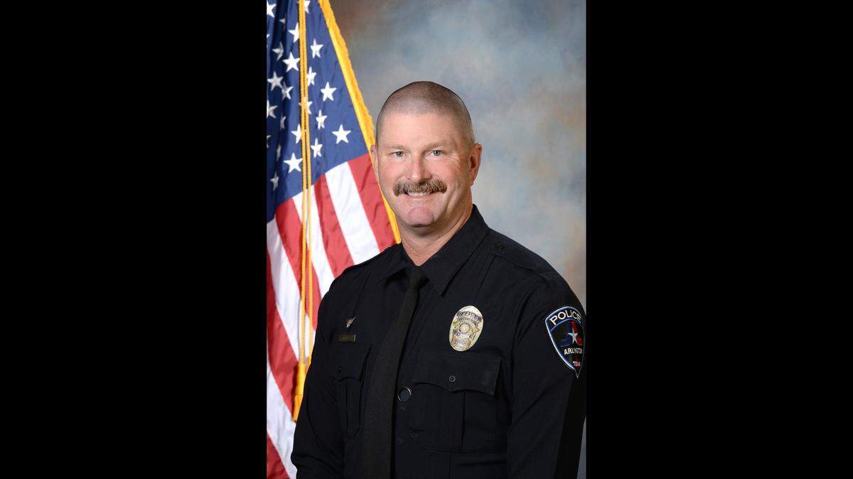 Arlington police officer Darrin McMichael was killed in a hit-and-run accident while on his way to work the morning of Thursday, Sept. 21, 2023. He had served with the Arlington Police Department for 24 years.