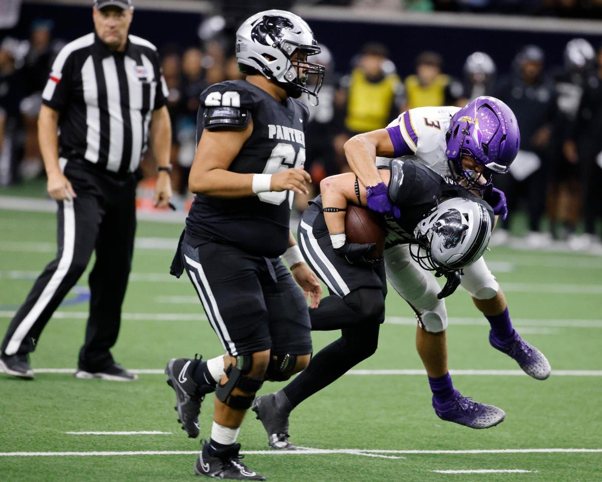 Alvarado defensive back Schyler Dethorne (3) drops Panther Creek running back Seth Jackson (3) for short yardage during a UIL 4A D1 Area round football playoff game at The Ford Center in Frisco Texas, Thursday, Nov. 21, 2024.