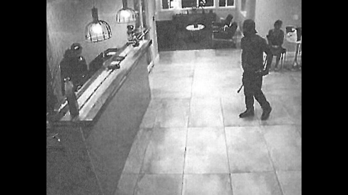 Curtis Vance Mathis is shown in this photograph renting a room at the Irving hotel where he sold a 13-year-old girl in November 2019, federal authorities said.