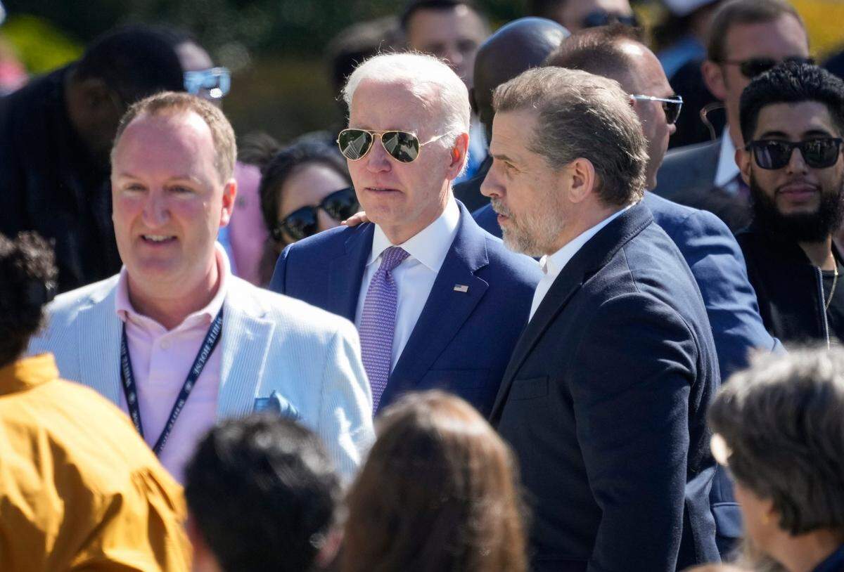 Hunter Biden, right, meets and speaks with his father President Joe Biden in April at the White House.