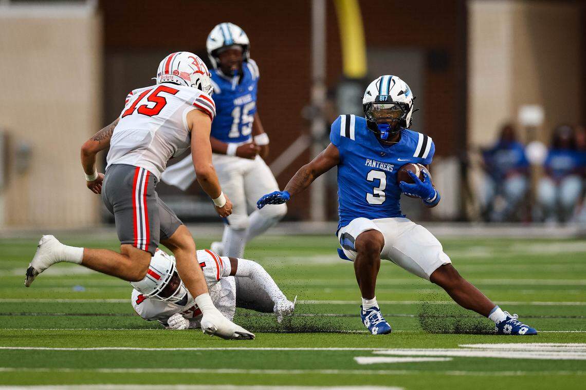North Crowley running back G'Yrell Smith runs past a defender and look ahead to the next Rockwall defender in a non-district game between North Crowley and Rockwall at Crowley ISD Stadium in Crowley, Texas on Sept. 18, 2025.