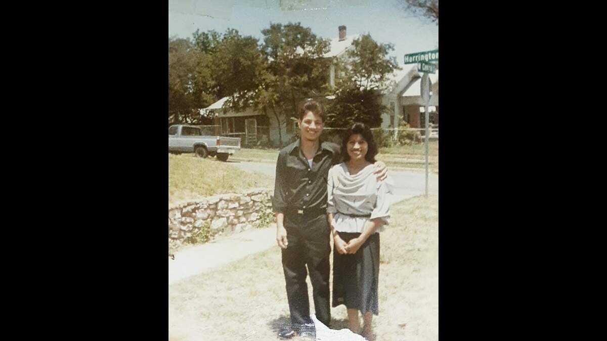 Henry Lopez (left) and Maria Lopez Sr. (right) smile for a photo taken early in their relationship. The two at first became friends in middle school and then dated in high school.