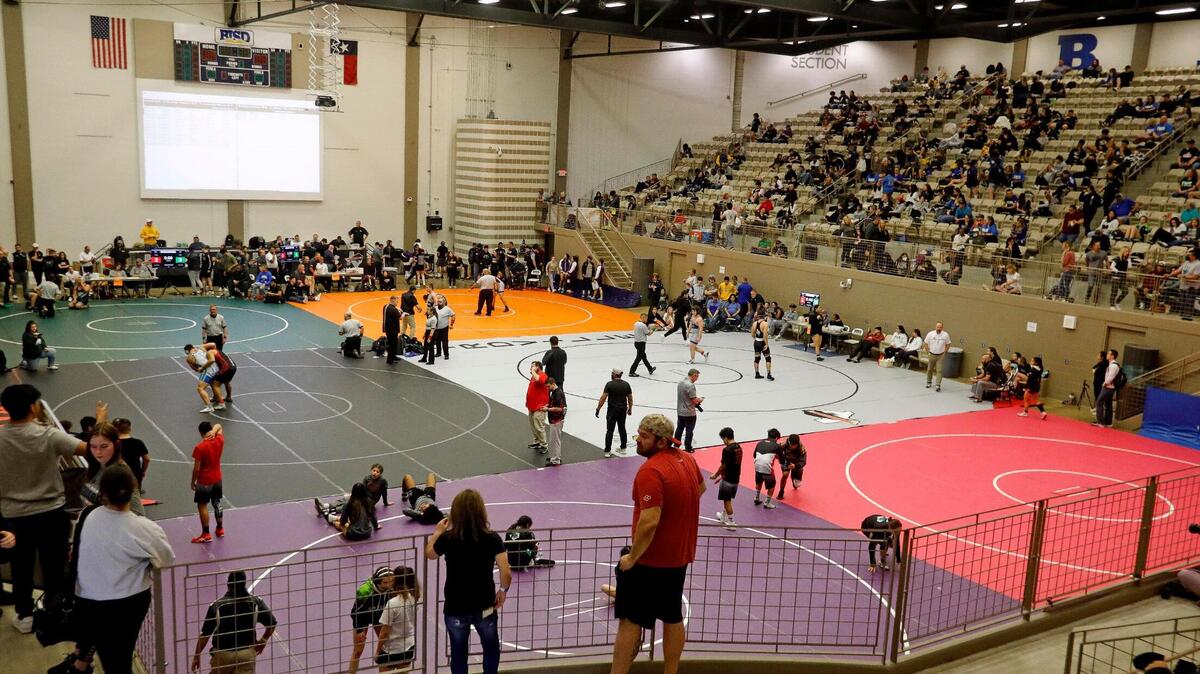 Fans watched six mats of wrestling during the UIL 6A Region 1 wrestling championships at Thomas Coliseum in Haltom City, Texas, Friday, Feb. 11, 2022. (Special to the Star-Telegram Bob Booth)