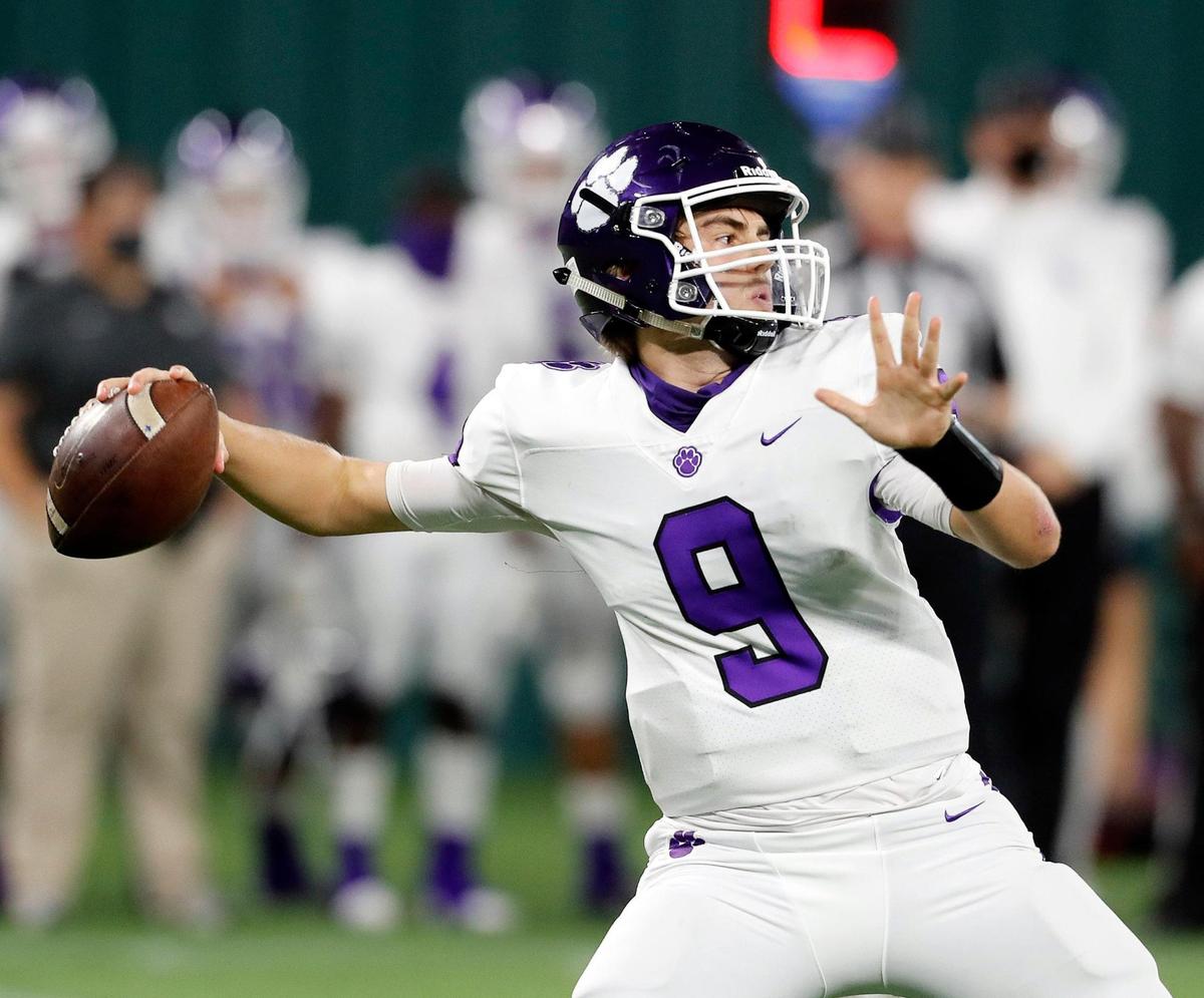Paschal quarterback Connor Culp throws a completion downfield during a high school football game at Globe Life Park in Arlington, Texas, Thursday, Nov. 12, 2020. Haltom led Paschal 13-7 at the half. (Special to the Star-Telegram Bob Booth)