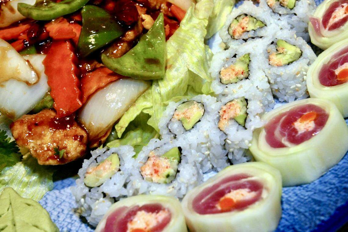 “General’s Chicken,” upper left, is shown with a crispy tuna roll, center, and cucumber-tuna at Oishii Sushi & Pan-Asian Restuarant in Dallas, April 2, 2004.