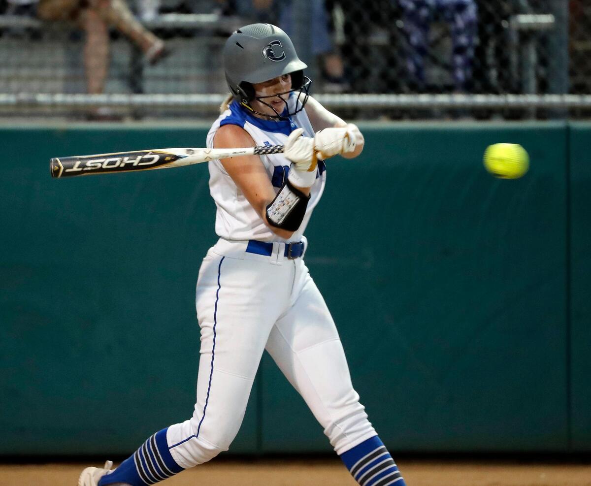 Burleson Centennial’s Kylie Barnes (16) gets a hit during a UIL 5A Region 1 quarter-final playoff softball name at Spartans Softball Field in Mansfield, Texas, Wednesday, May 11, 2022. Centennial defeated Northwest 7-5 in game one. Game two will be at Northwest High School Thursday with game three at Weatherford High School if necessary. (Special to the Star-Telegram Bob Booth)