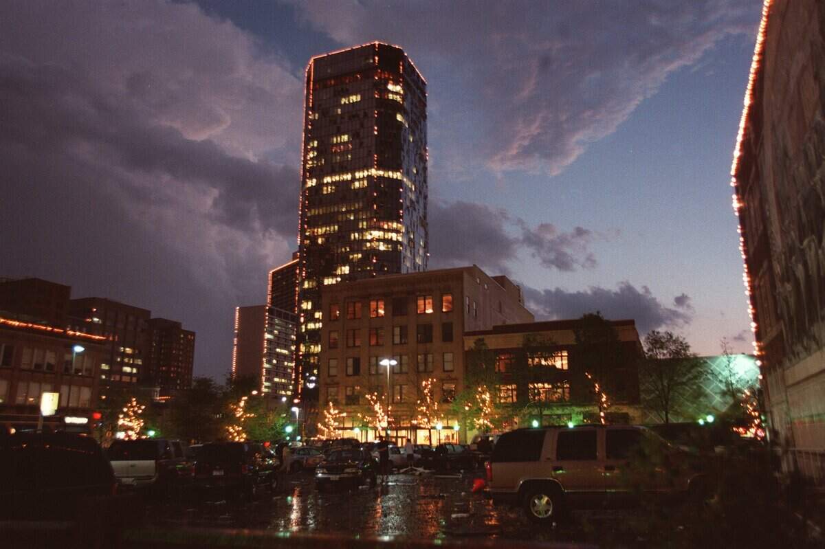 Clouds move past the Bank One building after a tornado touched down in downtown Fort Worth on March 28, 2000. After sitting dormant, the building was reborn as The Tower.