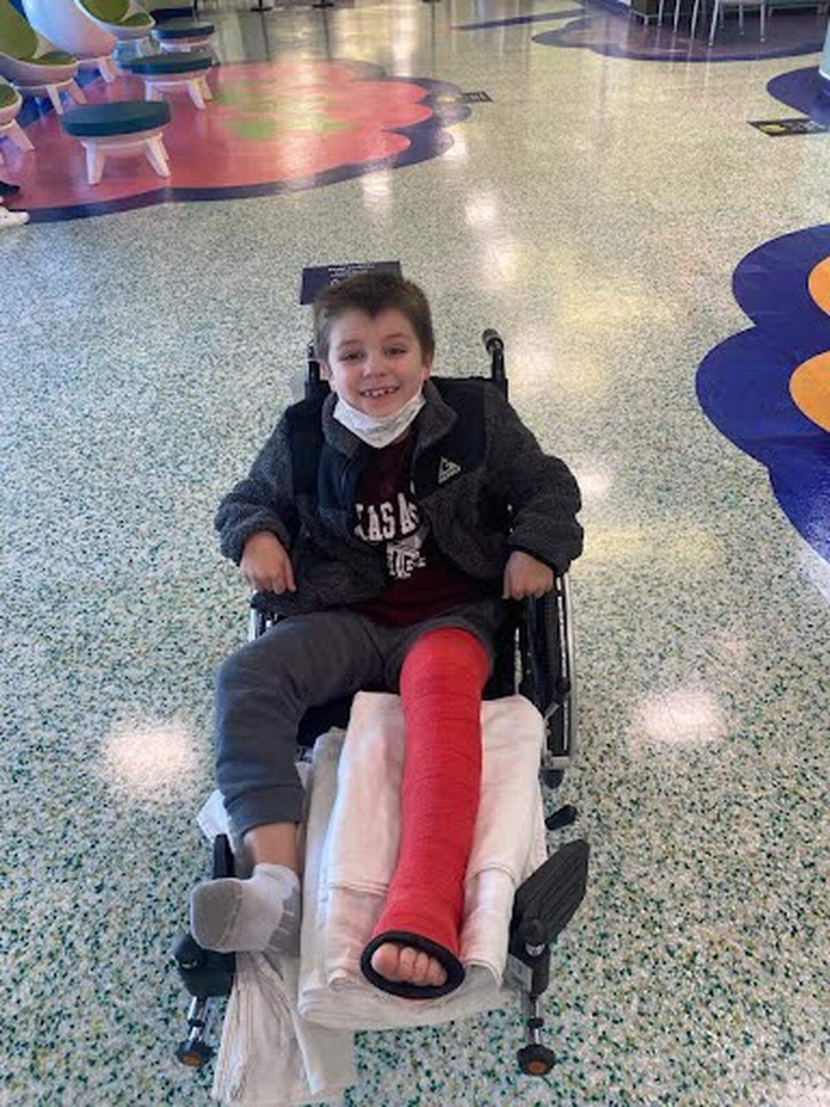 Micah Reed, 8, broke his leg at a North Texas trampoline park. He’s now in a full leg cast and is temporarily confined to a wheelchair.