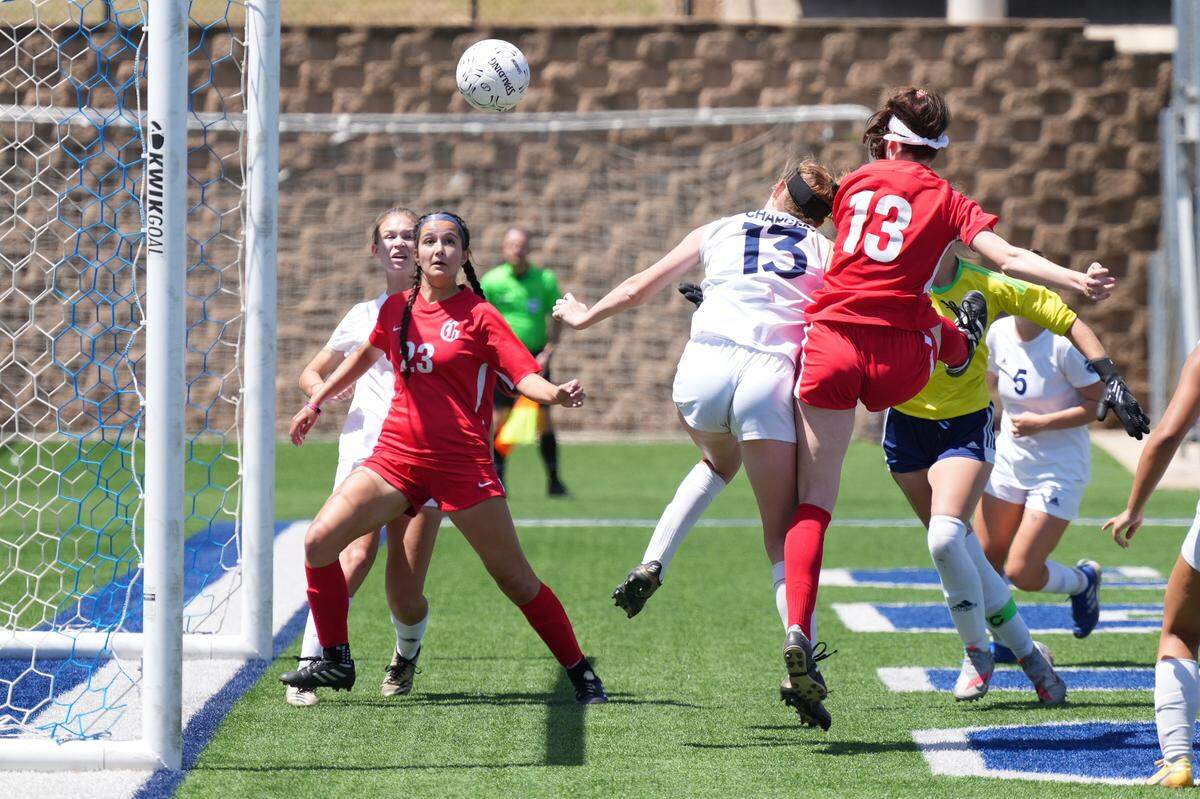 Kasten Merrill heads in a goal for Grapevine during a state semifinal vs. Boerne Champion. (Ken Murphy/MaxPreps)
