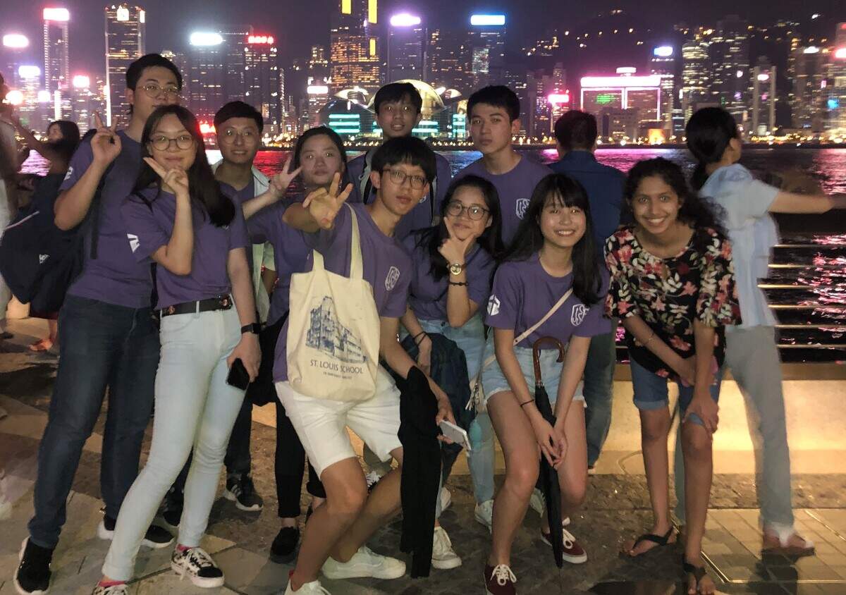Ruhani Ahluwalia, 16, (on right) a student at Harmony School of Innovation in Fort Worth, was named the best overseas delegate presenting at an international science fair in Hong Kong in August. Here, Ruhani tours Hong Kong with the students participating in the science fair.