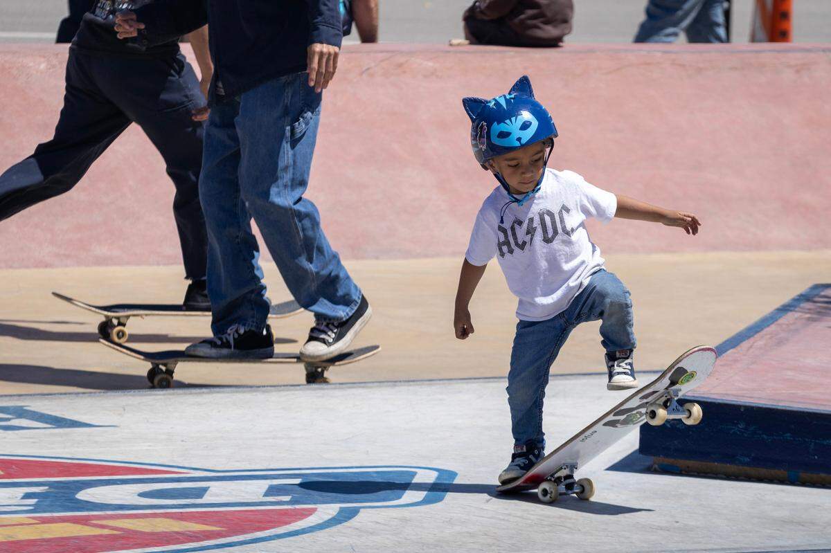 Eli Arriola, 4, practices on his board at the Dickies Skate Plaza in Fire Station Park on Saturday, April 29, 2023 in Fort Worth. The opening day event featured live music, food trucks and local vendors like Magnolia Skate Shop.