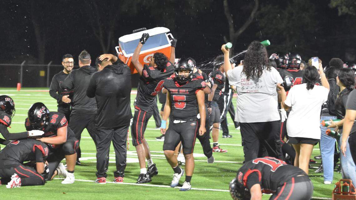 Diamond Hill Jarvis celebrates their first win in four years after a high school football game against South Hills at Scarborough-Handley Field in Fort Worth, Texas, Thursday, Aug. 28, 2025. Diamond Hill-Jarvis won 26-14.