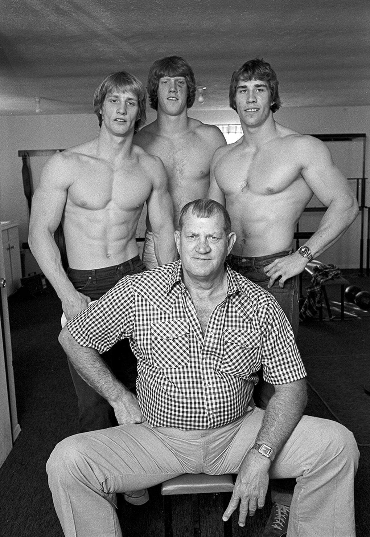 March 15, 1980: Pictured in their family home are Fritz Von Erich (seated) with his sons (from left) Kevin, David, and Kerry.