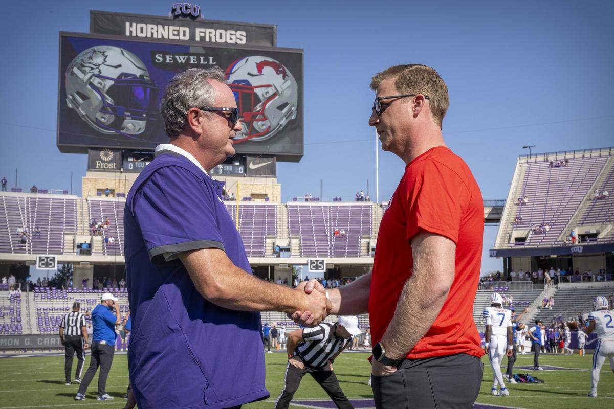 TCU head coach Sonny Dukes (left) and SMU head coach Rhett Lashlee before their game in 2023 at Amon G. Carter Stadium in Fort Worth.