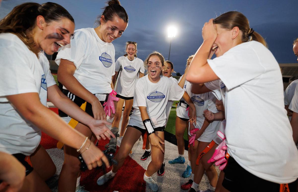 The Paschal Panthers celebrate their victory over Arlington Heights during the FWISD girls’ flag football championship on Tuesday, May 13, 2025, at Herman Clark Stadium.