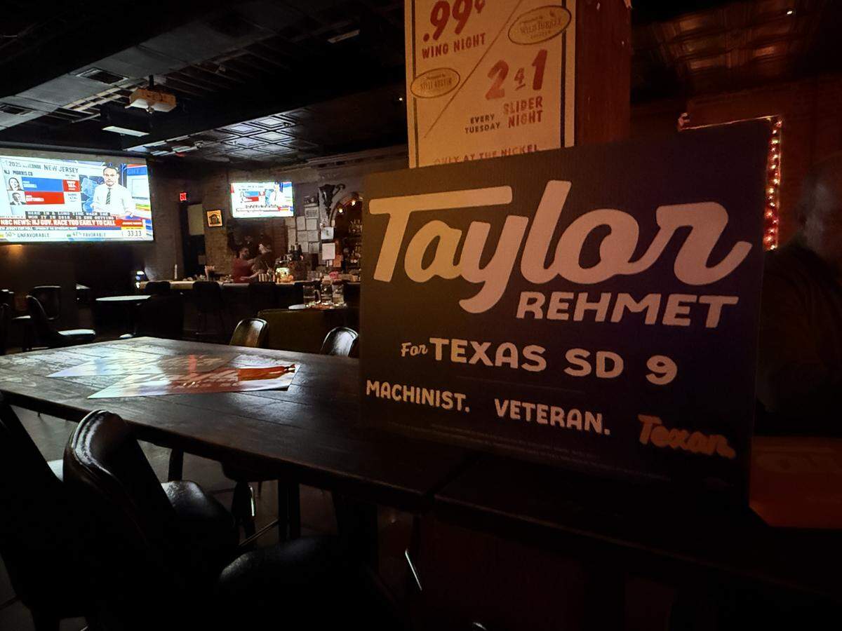 A sign supporting Taylor Rehmet is displayed at Nickel City in Fort Worth, where he’s hosting an Election Night watch party.